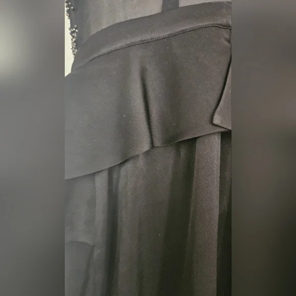 BEBE 90s Beaded top peplum mini dress. Size small - Picture 9 of 11